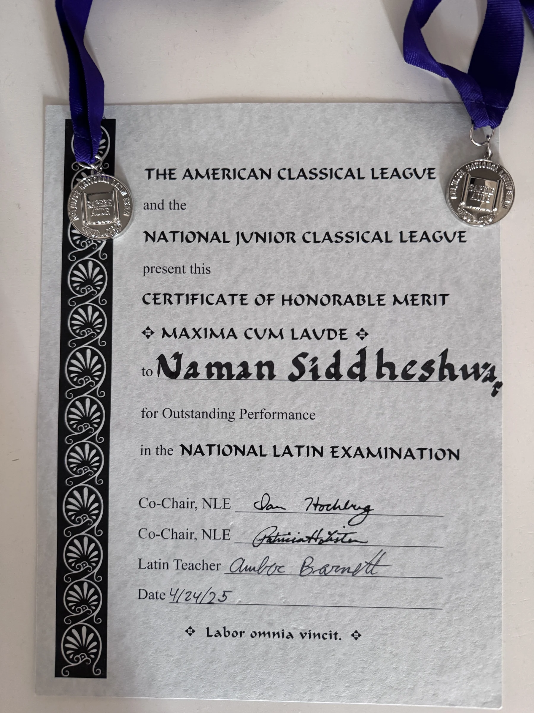 National Junior Classical League Maxima Cum Laude certificate with two medals